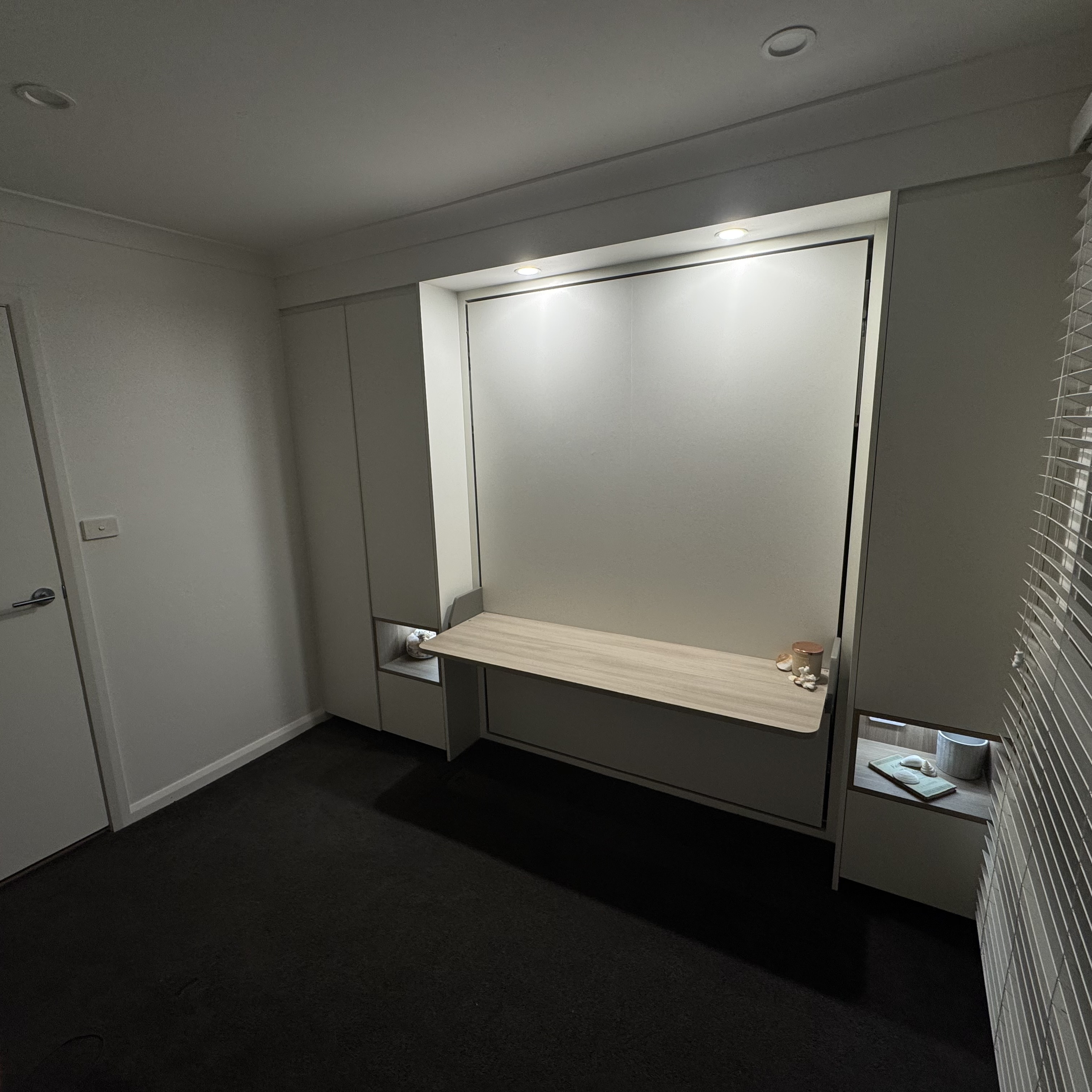 Custom wall bed by TW Fixouts — Integrated desk · Lighting & storage